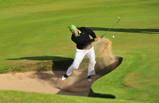 Stewart Cink hits out of a bunker at Turnberry