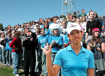 The legions of golfer Michelle Wie's fans!