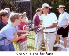 Chi Chi signs for fans